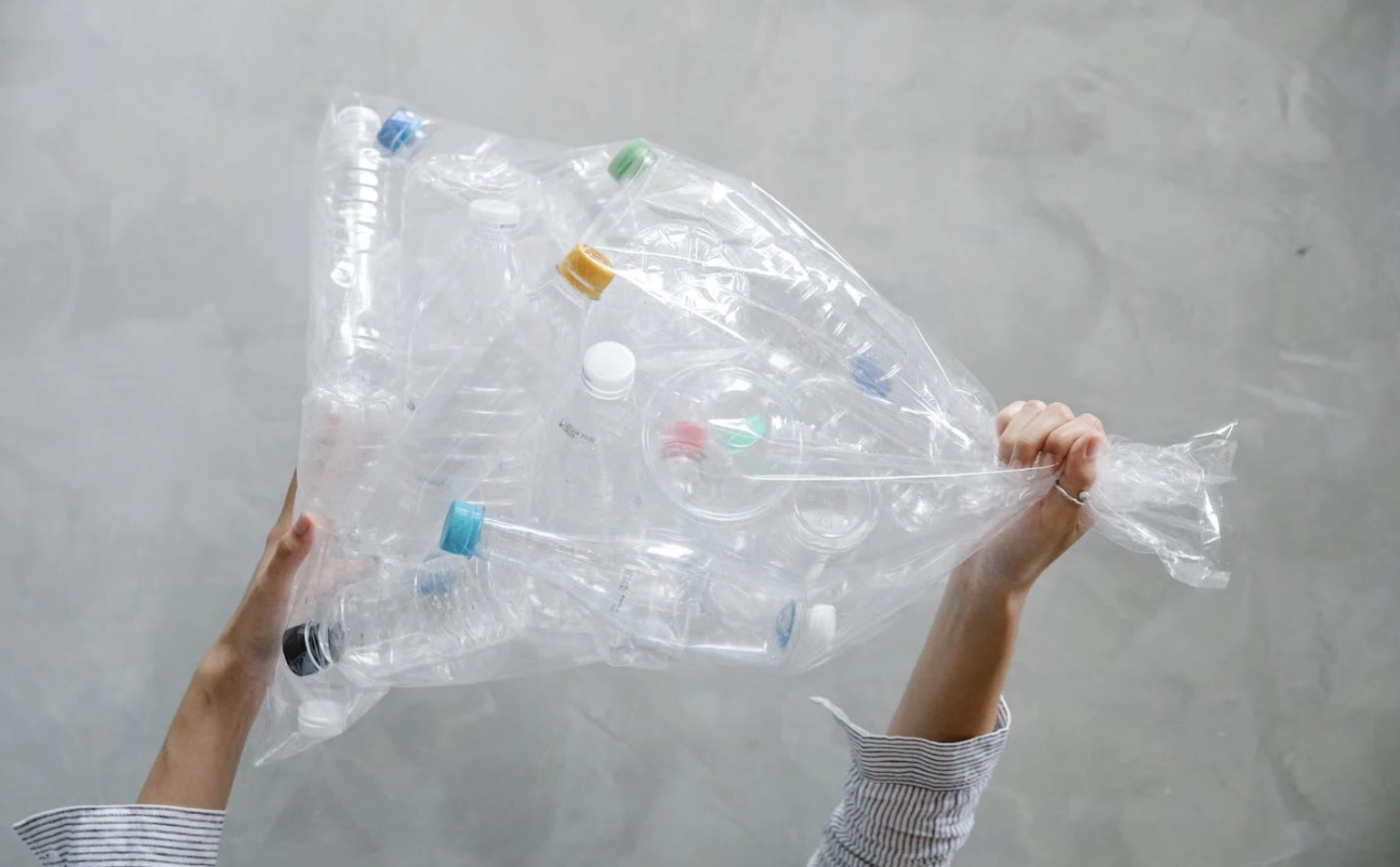 Plastic Garbage bag in hands.