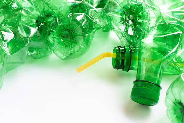 Green plastic bottles on the table